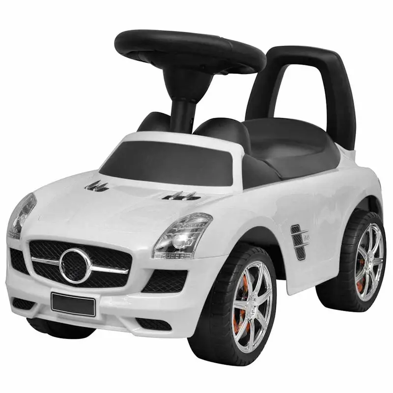 Coche de niños accionado con el pie blanco
