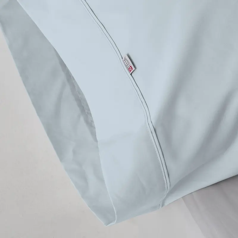 Funda de almohada azul celeste
