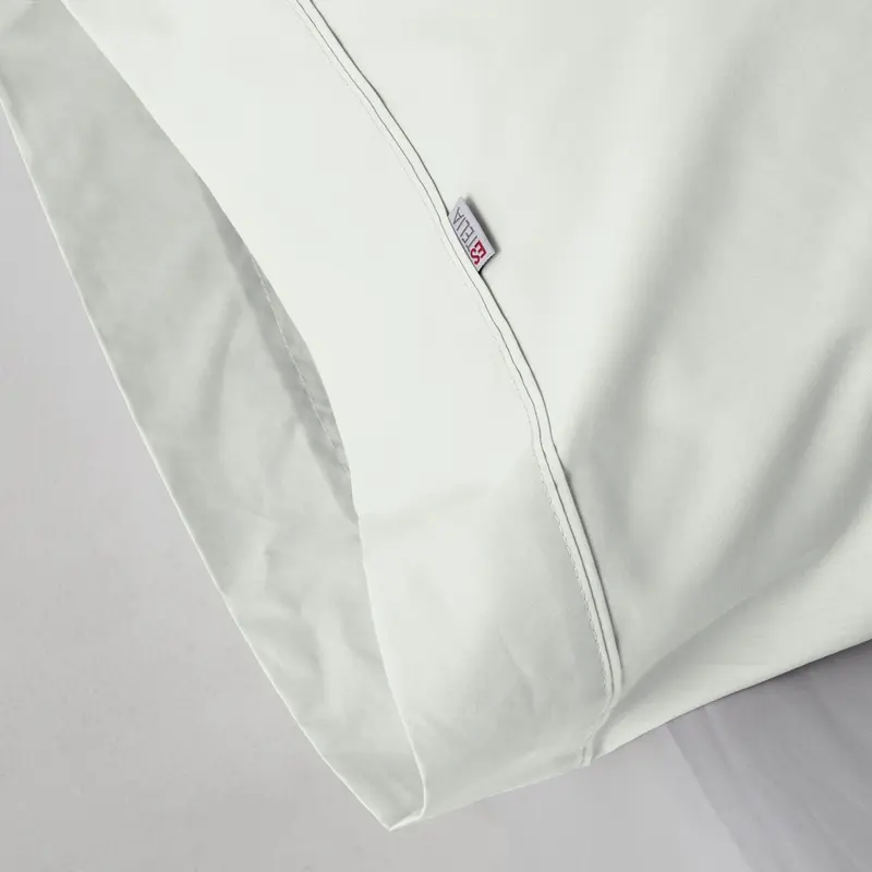 Funda de almohada percal hueso