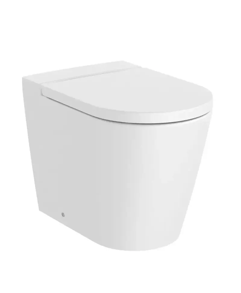 Inodoro salida dual de Supralit de tanque alto con un acabado en color blanco mate Rimless Round Inspira Roca