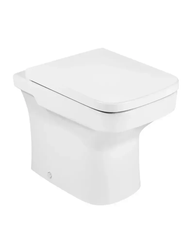 Inodoro salida dual para tanque alto de 36 cm fabricado en porcelana de color blanco Dama Roca