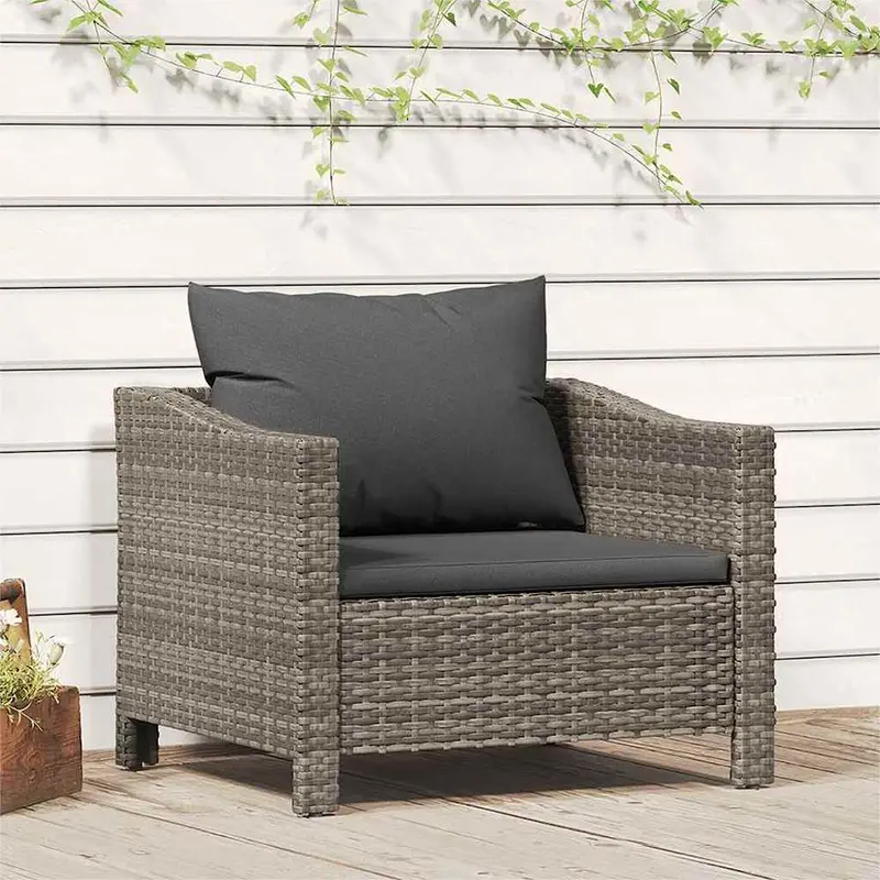 Sillón de jardín con cojín de ratán sintético gris