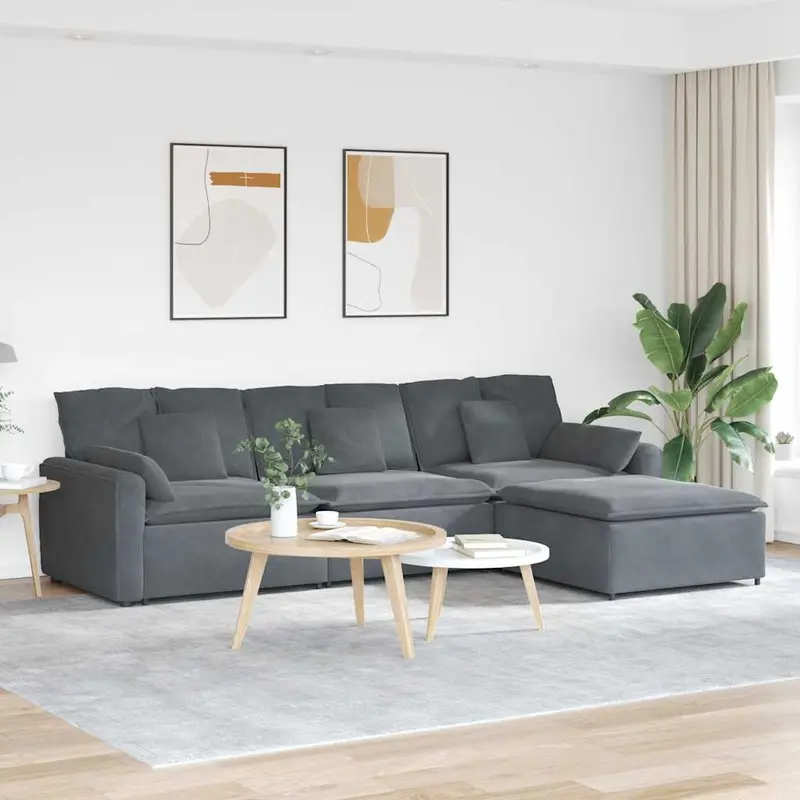 Sofá modular con reposapiés y cojines gris oscuro