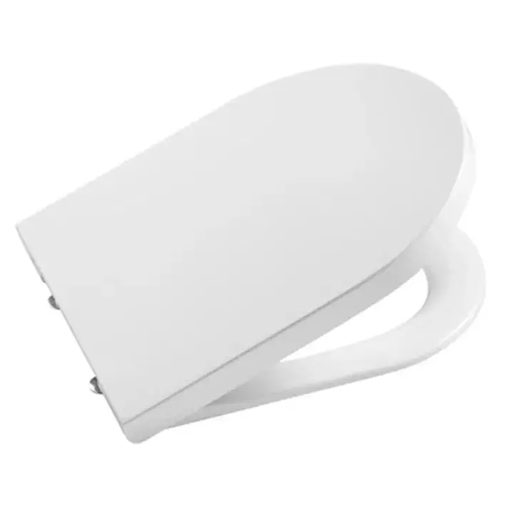 Tapa y aro compacto fabricados en material antibacteriano y latón cromado Round con caída amortiguada Inspira Roca A80152C00B